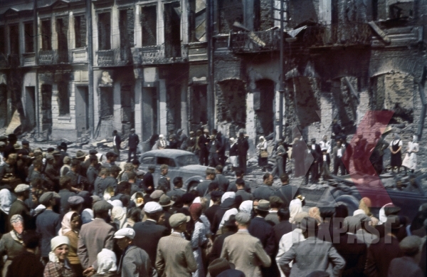 stock-photo-wehrmacht-army-vehicle-convoy-drive-through-bombed-destroyed-smolensk-russia-1942-parade-civilians-9186.jpg